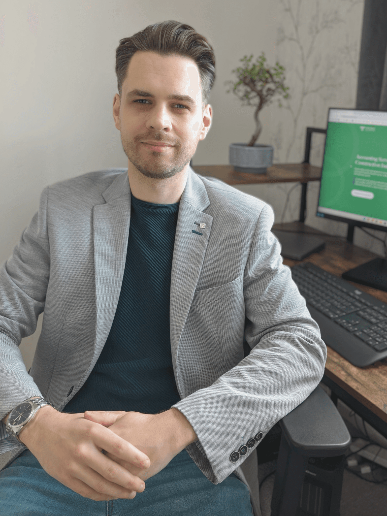 Jason Wright CGMA — CIMA Qualified Management Accountant in his office
